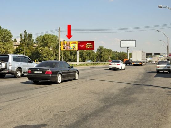 Фото рекламної площини за адресою Кольцевая дорога - Зодчих ул., 30, разделитель, возле рынка "Борщаговский", в сторону Одесская пл., левая