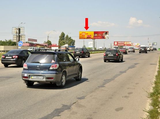 Фото рекламної площини за адресою Кольцевая дорога - Зодчих ул., 30, разделитель, возле рынка "Борщаговский", в сторону Победы пр., левая