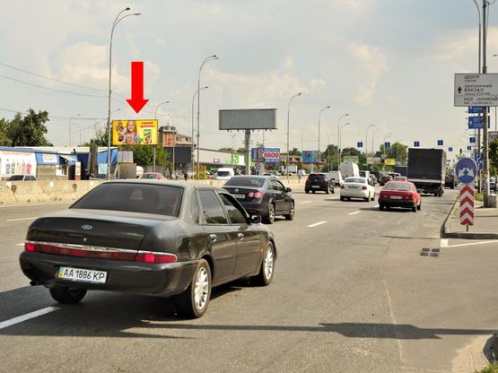 Фото рекламной плоскости по адресу Палладина ул. / Стеценка ул., на светофоре, возле магазина "Ашан", "Новус", "Эпицентр" - к Победы пр.