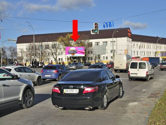 Фото рекламной плоскости по адресу Васильковская ул. / Амурская пл., ст. м. "Васильковская", на светофоре, в центр