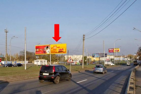 Фото рекламной плоскости по адресу Заболотного ул. / Коммунальная ул., в сторону Столичное шоссе, 1300м до ТРЦ "ART Mall", разделитель, правый