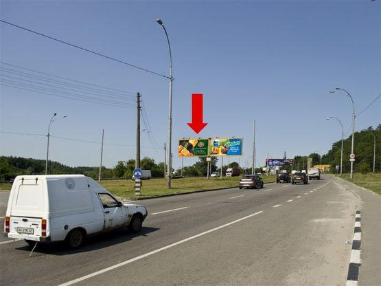 Фото рекламной плоскости по адресу Заболотного ул. / Коммунальная ул., в сторону Одесская пл., перед АЗС "БРСМ нафта", разделитель, левый