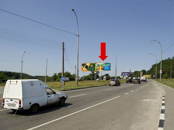 Фото рекламной плоскости по адресу Заболотного ул. / Коммунальная ул., в сторону Одесская пл., перед АЗС "БРСМ нафта", разделитель, правая