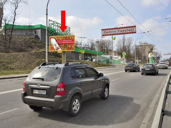 Фото рекламной плоскости по адресу Протасов Яр ул., 60м. от поворота на Амосова ул., в сторону Соломенская пл.