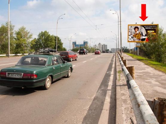 Фото рекламной плоскости по адресу Полярная ул., мост, в сторону Богатырская ул.