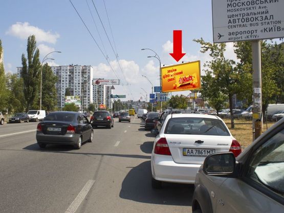 Фото рекламної площини за адресою Малиновского ул., 15, через дорогу возле ТРЦ "Метрополис", в сторону Оболонский пр.