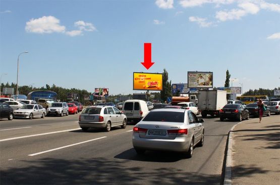 Фото рекламной плоскости по адресу Харьковская пл., разделитель, выезд с Харьковского шоссе в сторону Бажана пр.