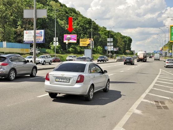 Фото рекламной плоскости по адресу Набережное шосе, 25, 100м от ст. м. "Днепр", в сторону ст. м. "Почтовая площадь"