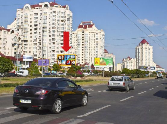 Фото рекламної площини за адресою Тимошенко ул., 29, разделитель, возле супермаркета "Фокстрот", в сторону Героев Сталинграда пр.