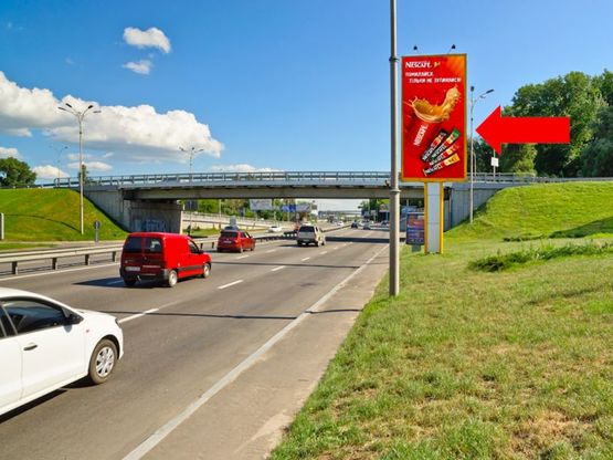 Фото рекламной плоскости по адресу Набережное шоссе, развязка на мосту Патона, в сторону моста Южного