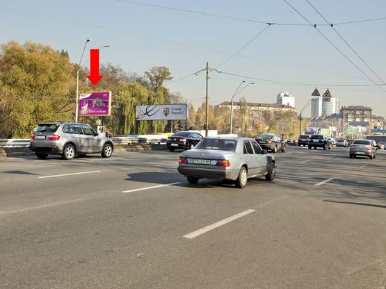 Фото рекламной плоскости по адресу Победы пр., 57, ст. м. "Берестейская", напротив АЗС "ТНК", в центр