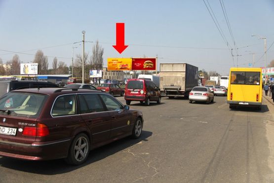 Фото рекламної площини за адресою Кольцевая дорога, разделитель, напротив супермаркетов "Ашан", "Эльдорадо", в сторону Победы пр., левая