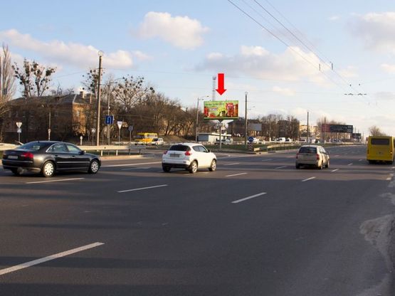 Фото рекламної площини за адресою Кольцевая дорога / Победы ул., разделитель, в сторону Одесская пл.