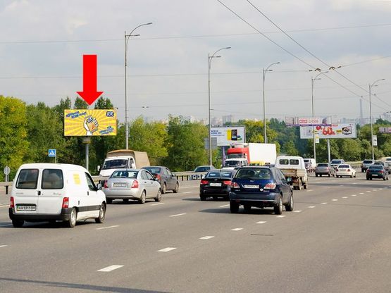 Фото рекламной плоскости по адресу Ватутина пр., въезд на мост Московский, в сторону Троещины