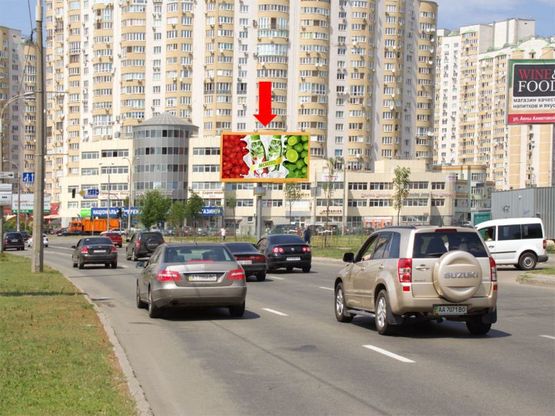 Фото рекламной плоскости по адресу Днепровская Набережная / Тальневская ул., в сторону мост Патона