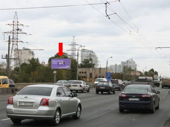 Фото рекламной плоскости по адресу Бандеры пр. (бывш. Московский пр.) / Иорданская ул. (бывш. Гавро ул.), напротив ТЦ "METRO", в сторону мост Московский