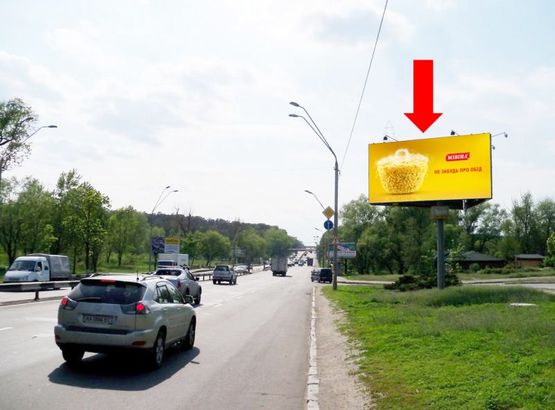 Фото рекламної площини за адресою Победы пр. / Ушакова ул., из центра