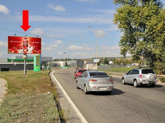 Фото рекламной плоскости по адресу Столичное шоссе, возле АЗС "ВОГ", ТЦ "Домосфера", съезд с Новообуховской трассы иЗаболотного ул. на Столичное шоссе