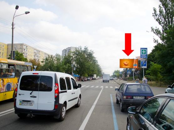 Фото рекламной плоскости по адресу Малышка ул., напротив выезда с Дарницкий бул., в сторону ст. м. "Черниговская"