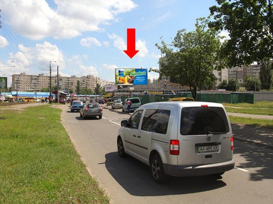 Фото рекламної площини за адресою Симиренко ул., 8 / Желудева ул., возле рынка, Универсама, в сторону Королева пр.