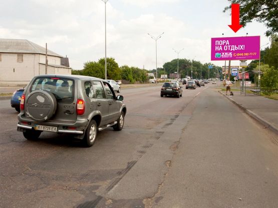 Фото рекламной плоскости по адресу Палладина пр., возле супермаркета "Эпицентр", в сторону ст. м. "Академгородок"