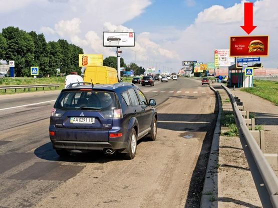 Фото рекламної площини за адресою Кольцевая дорога, перед Жулянским мостом над железной дорогой, в сторону Одесская пл.