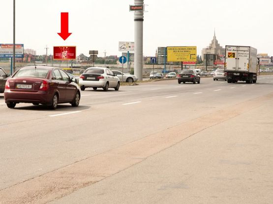 Фото рекламной плоскости по адресу Кольцевая дорога, за Жулянским мостом над железной дорогой, в сторону Победы пр.