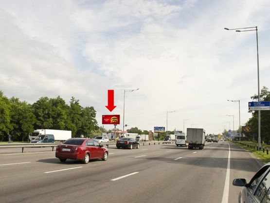 Фото рекламної площини за адресою Столичное шоссе, возле АЗС "Лукойл", перед развязкой с Науки пр., из центра