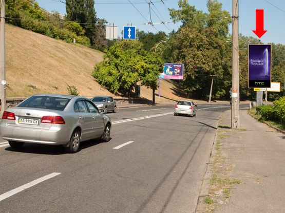 Фото рекламной плоскости по адресу Подольский спуск, 200м от Овручская ул., в сторону центра