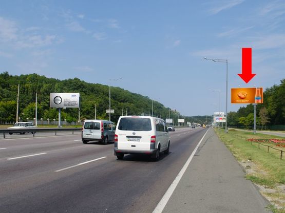 Фото рекламной плоскости по адресу Столичное шоссе, возле заезда на насосную станцию "Мышеловская", разделитель, в сторону Надднепрянского шоссе