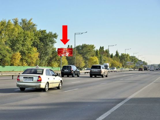 Фото рекламної площини за адресою Столичное шоссе, возле заезда на насосную станцию "Мышеловская", разделитель, в сторону Науки пр.