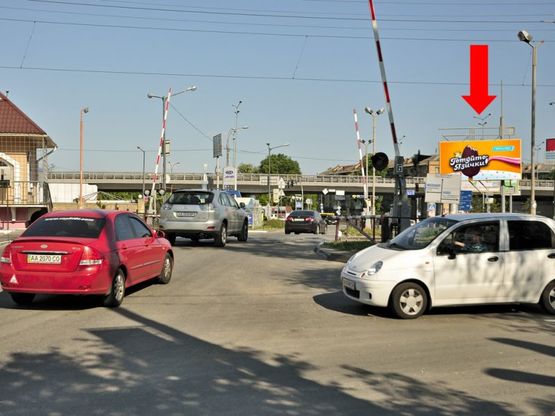 Фото рекламной плоскости по адресу Науки пр., съезд на Столичное шоссе, в сторону Столичное шоссе