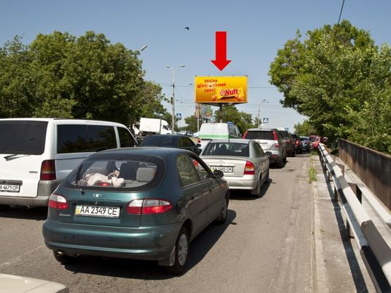Фото рекламной плоскости по адресу Воздухофлотский пр., разделитель, выезд с Жилянская ул., в сторону Победы пр., Черновола ул.