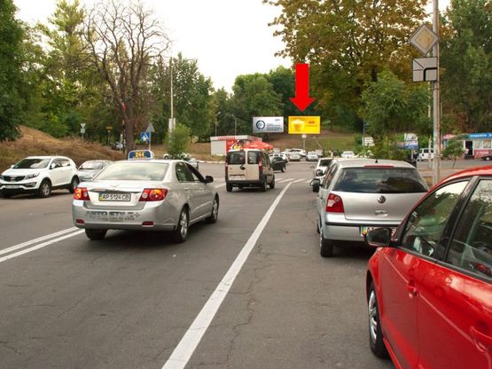 Фото рекламної площини за адресою Кудряшова ул. / Механизаторов ул., ЖК "Времена года", супермаркет "Поляна", в сторону Соломенская ул.