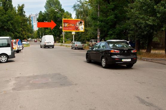 Фото рекламной плоскости по адресу Шпака ул., 2, зеленая зона, в сторону Дегтяревская ул.