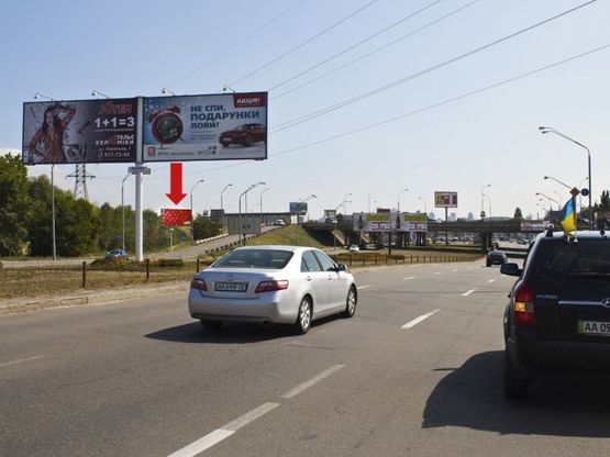 Фото рекламної площини за адресою Оболонский пр., съезд с моста по Богатырской ул., в сторону Бандеры пр. (бывш. Московский пр.)