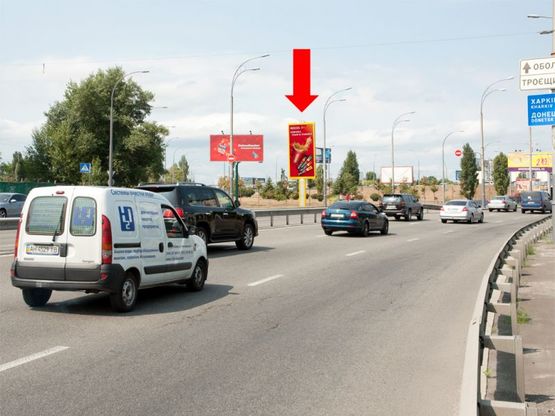 Фото рекламной плоскости по адресу Набережно-Рыбальская ул., 200м до Бандеры пр. (бывш. Московский пр.), в сторону Оболони, мост Московский