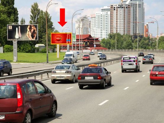 Фото рекламной плоскости по адресу Набережно-Рыбальская ул., 230м до Петровского жд моста, в сторону Героев Сталинграда пр.