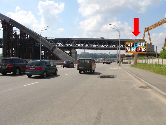 Фото рекламної площини за адресою Набережно-Рыбальская ул., 100м за мостом, в сторону Подола