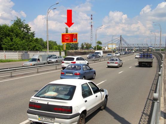 Фото рекламной плоскости по адресу Набережно-Рыбальская ул., 170м до поворота на Электриков ул., в сторону Героев Сталинграда пр.