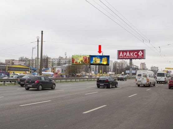 Фото рекламної площини за адресою Кольцевая дорога, разделитель, напротив супермаркетов "Ашан", "Эльдорадо", в сторону Теремков, правая