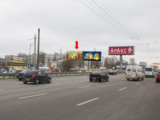 Фото рекламной плоскости по адресу Кольцевая дорога, разделитель, напротив супермаркетов "Ашан", "Эльдорадо", в сторону Теремков, левая