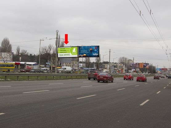 Фото рекламної площини за адресою Кольцевая дорога, разделитель, напротив супермаркетов "Ашан", "Эльдорадо", в сторону Победы пр., левая