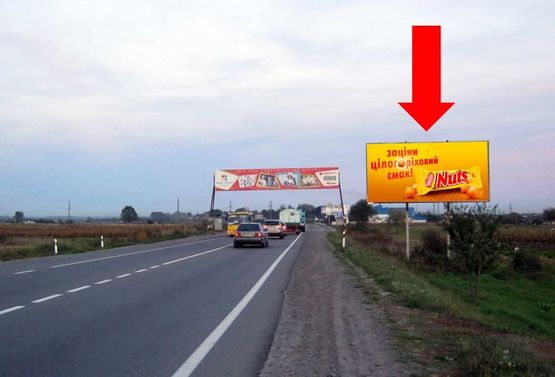 Фото рекламной плоскости по адресу Трасса Львов-Краковец, с. Подрясное, въезд в город
