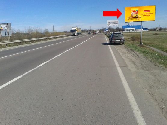 Фото рекламної площини за адресою Трасса Львов-Краковец, с. Подрясное, въезд в город
