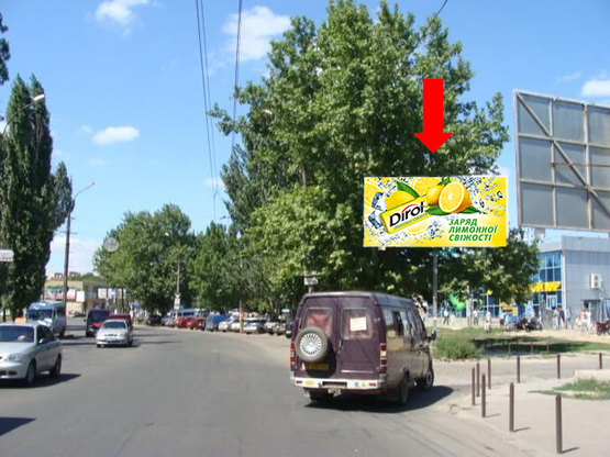 Фото рекламной плоскости по адресу Мира пр., возле рынка "Колос", супермаркетов "Велмарт", "Эльдорадо", в сторону кольца автовокзала, центра