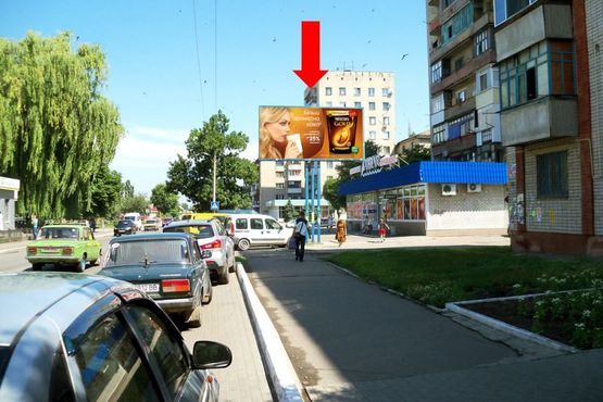 Фото рекламной плоскости по адресу Полтавская ул., 107 / Соборная ул. (бывш. Ленина ул.), возле супермаркета