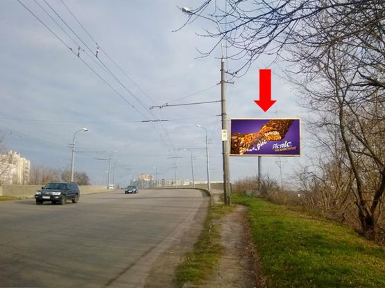 Фото рекламной плоскости по адресу Владимира Кн. пр., возле ж/д путепровода