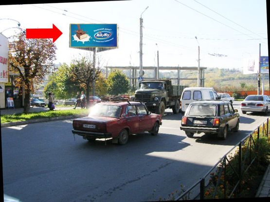 Фото рекламной плоскости по адресу Героев Майдана ул. (бывш. Красноармейская ул.), 115 / Комарова ул., из центра