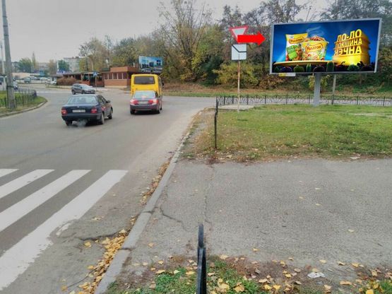 Фото рекламной плоскости по адресу Гагарина ул. / Смирнова ул., возле Ощадбанка